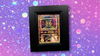 Decorative Pokemon card with a black frame on a colorful, bubble-patterned background